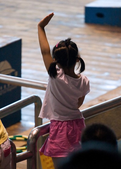 Girl Asking Question - Raising Hand