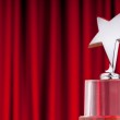 Star award against curtain background