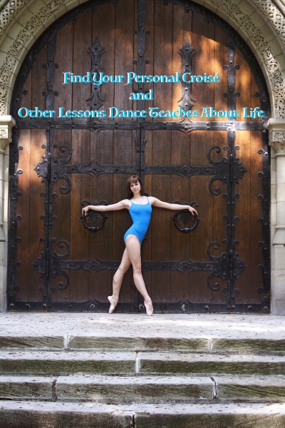 Dancer in blue in front of a large door
