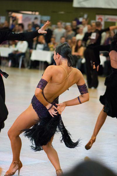 Latin dancer leans back
