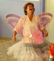 IMAGE Alexandra of Hullaballoo Danceshop looks jovial in butterfly wings as she waves a magic wand over her creative dance class. IMAGE