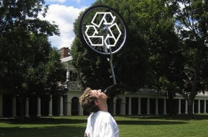 IMAGE Upcycle - a man balances a unicycle on his chin. IMAGE