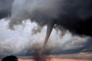 IMAGE A large and powerful tornado funnel looms in the sky. IMAGE