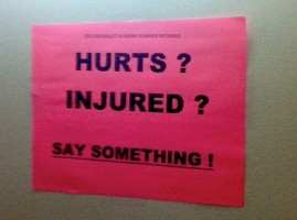 IMAGE A sign encouraging dance students to report their injuries IMAGE