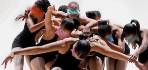 IMAGE Blindfolded dancers in a group IMAGE