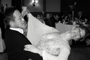 IMAGE A couple dance the waltz dressed in formal wear for competition IMAGE