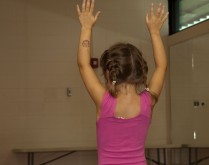 girl dancing, in pink