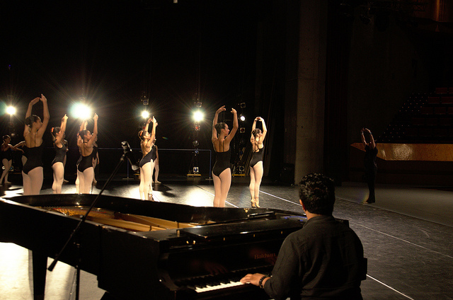 Dancers warming up onstage